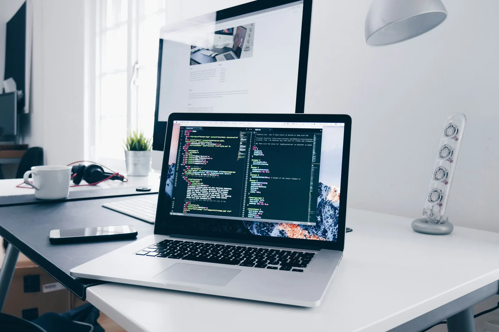 Developer workspace with code on screen during WordPress maintenance work